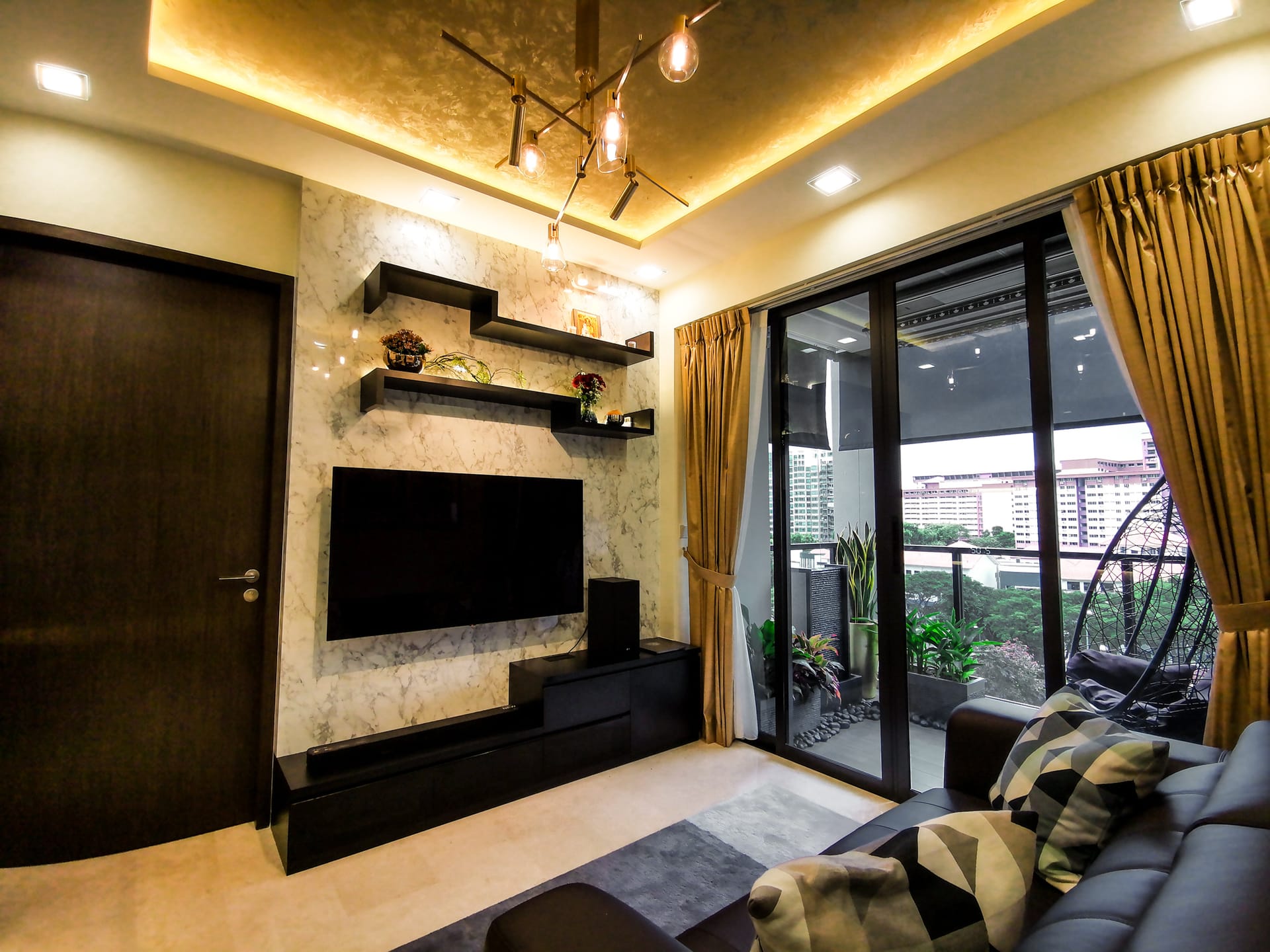 Botanique At Bartley compact luxury condominium interior featuring custom entertainment console and study nook