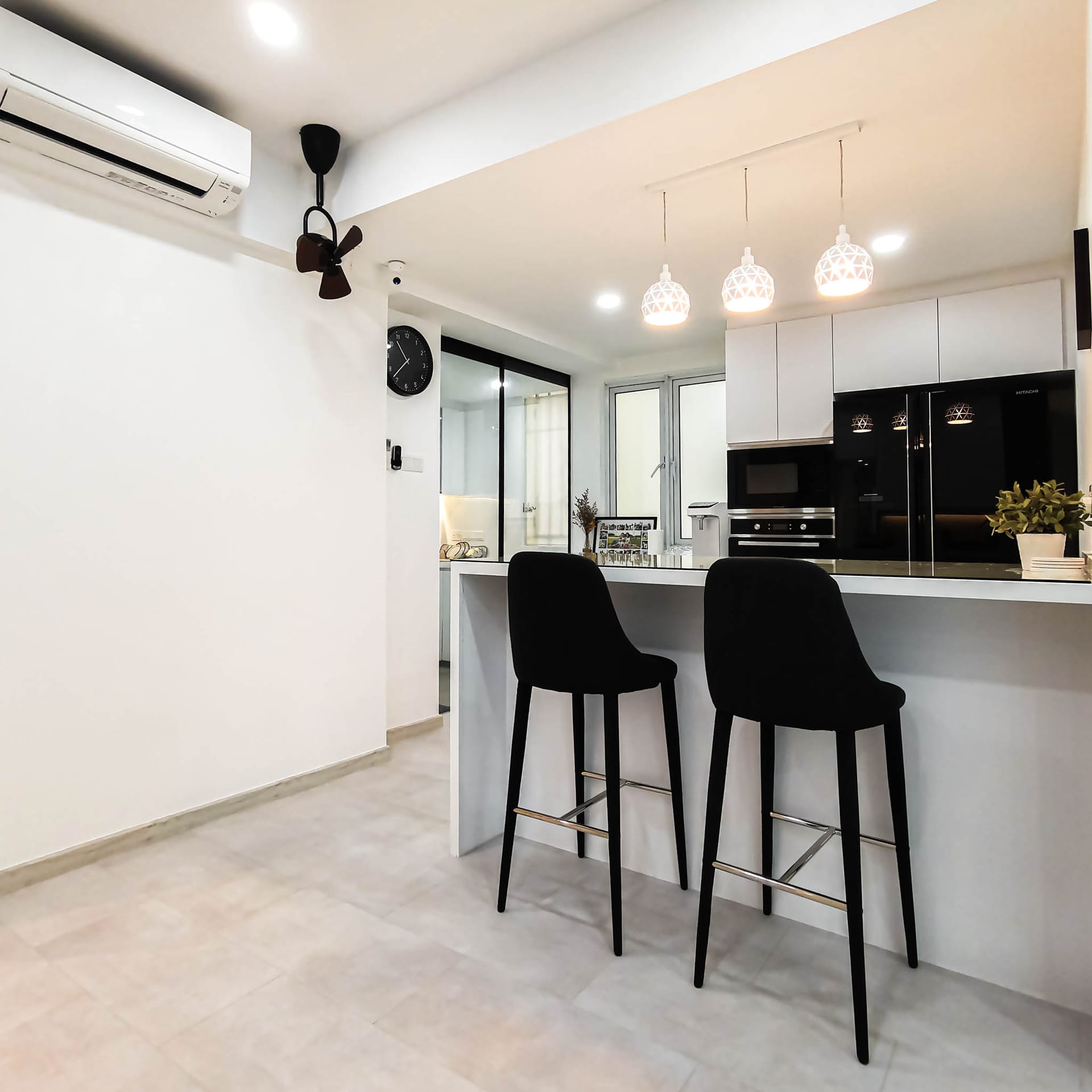 Euphony Gardens private condominium living area with warm-white LED cove ceiling troughs and custom joinery