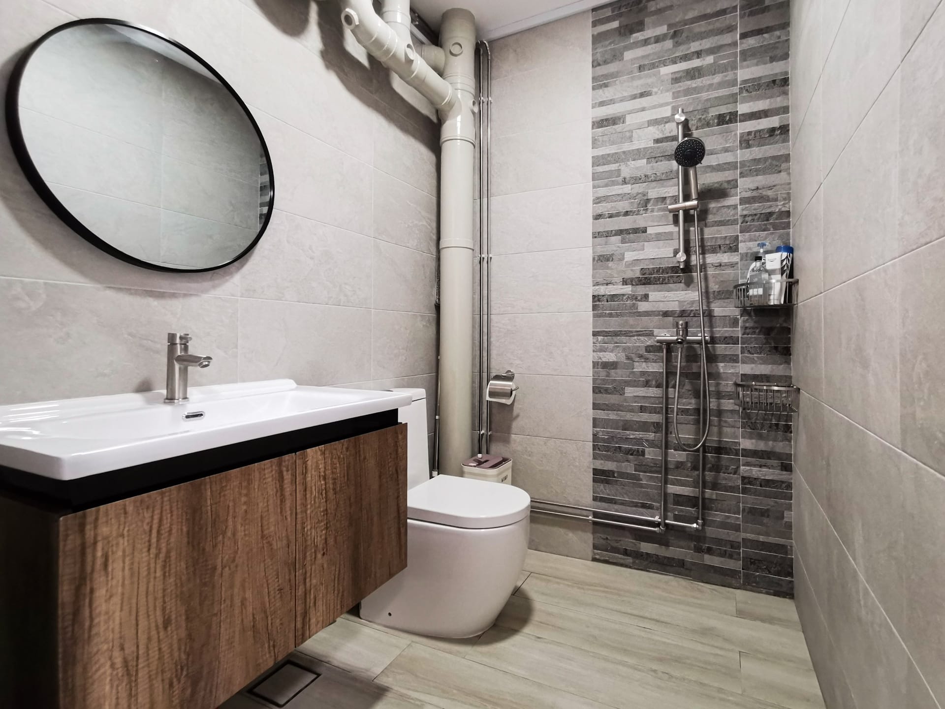 272 Bishan mature HDB resale flat overhauled with grey sintered stone island and open concept layout